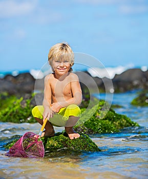 Young boy having fun on tropcial beach