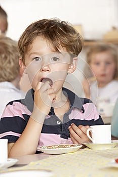 Young Boy Having Tea at Montessori/Pre-School