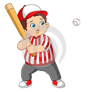 Young boy hitting the ball in a youth Baseball game