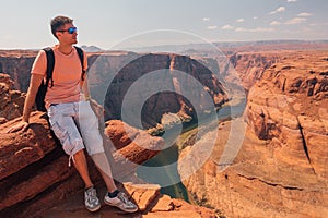 Young boy at the Horse shoe bend in the USA.