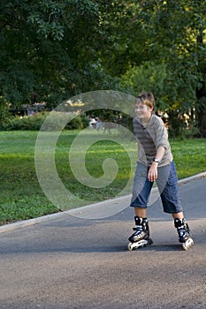Young boy inline skating