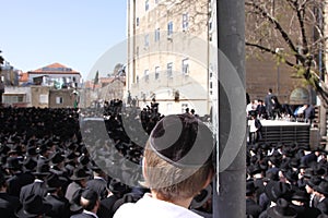 Young Boy at Jewish Funeral