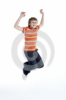 Young Boy Jumping In Air