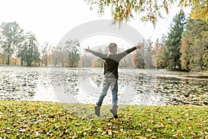 Young boy jumping for joy