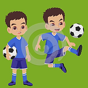 Young boy junior soccer player playing football photo