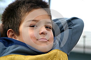 Young Boy Kicking Back