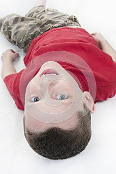 Young boy laying down