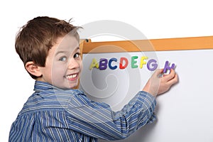 Young boy learning the ABC