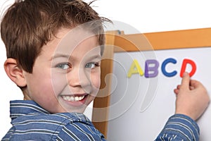 Young boy learning the ABC