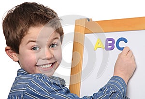 Young boy learning the ABC