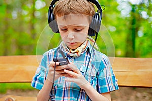 Young boy listening to music