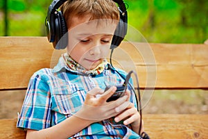 Young boy listening to music