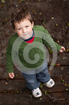 Young boy looking up