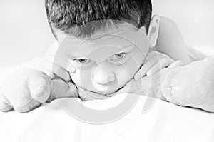 Young boy looking upset