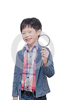 Young boy with magnifying glass