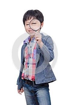 Young boy with magnifying glass