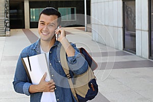 Young boy making fun plans on the phone with space for copy