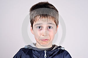 Young boy making a funny face