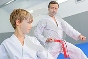 Young boy in martial arts lesson