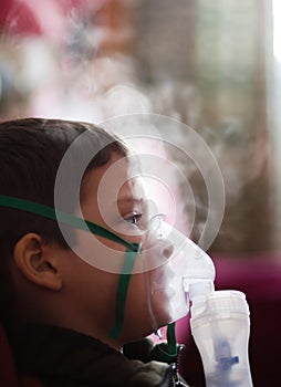Young boy with nebuliser
