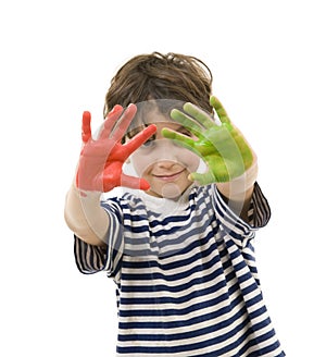 Young boy with painted hands