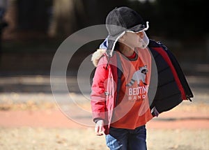 YOUNG BOY IN PARK