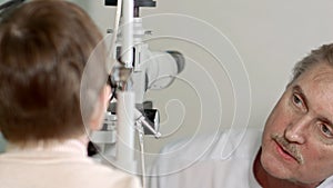 Young boy patient is having a medical attendance at the optometrist