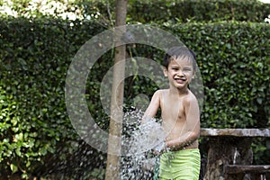 Young boy played water