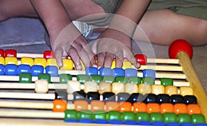 Young Boy Playing Abacus