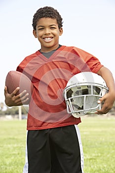 Young Boy Playing American Football