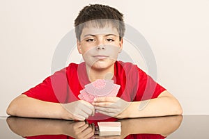 Young boy playing cards