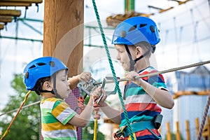 Young boy playing and having fun doing activities outdoors. Happiness and happy childhood concept