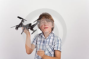 Young boy playing with hist drone photo