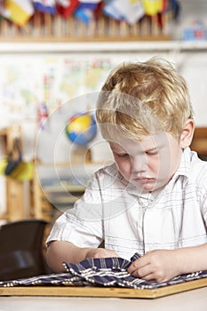 Young Boy Playing at Montessori/Pre-School