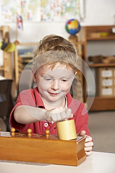 Young Boy Playing at Montessori/Pre-School