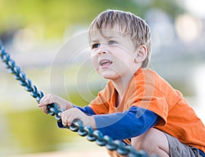 Young boy playing outside