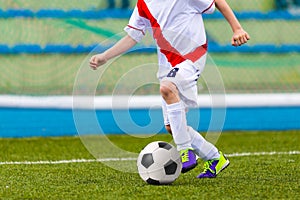 Young Boy Playing Soccer Football Match