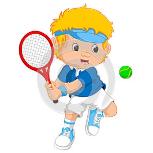 Young boy playing tennis with a racket