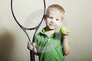 Young Boy Playing Tennis. Sport Children. Child with Tennis Racket and Ball