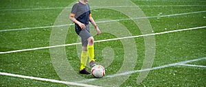 young boy playng football soccer, healthy lifestyle with successful futures