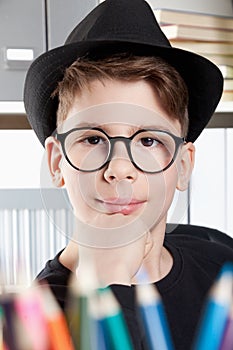 Young boy portrait with black hat