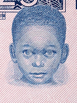 Young boy a portrait from Guinean money photo