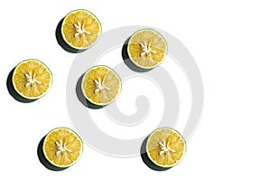 Pattern with fresh fruit mausambi slices on a white backgrounds