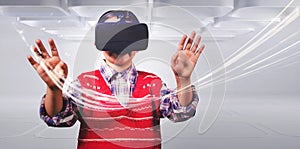 young boy in red jumper with virtual reality headset