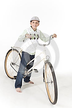 Young boy on a retro bike