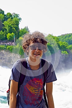 young boy in rhine falls, Switzerland