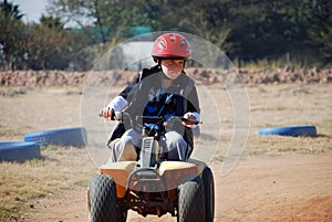 Young Boy riding a Quadbike