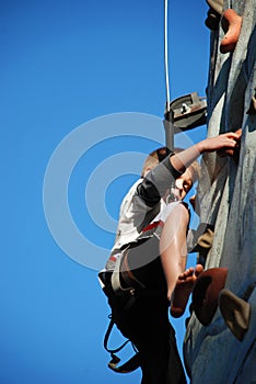 Young Boy Rock Climbing