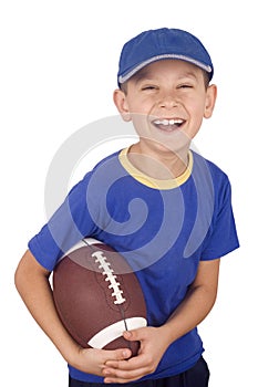 Young boy and rugby ball