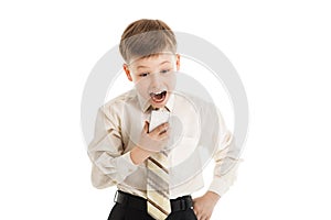 Young boy shout at a cellphone